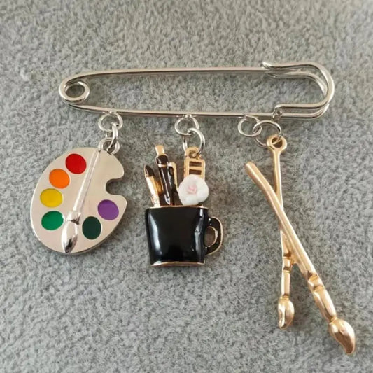 Colorful Paint Palette and Brushes Pin